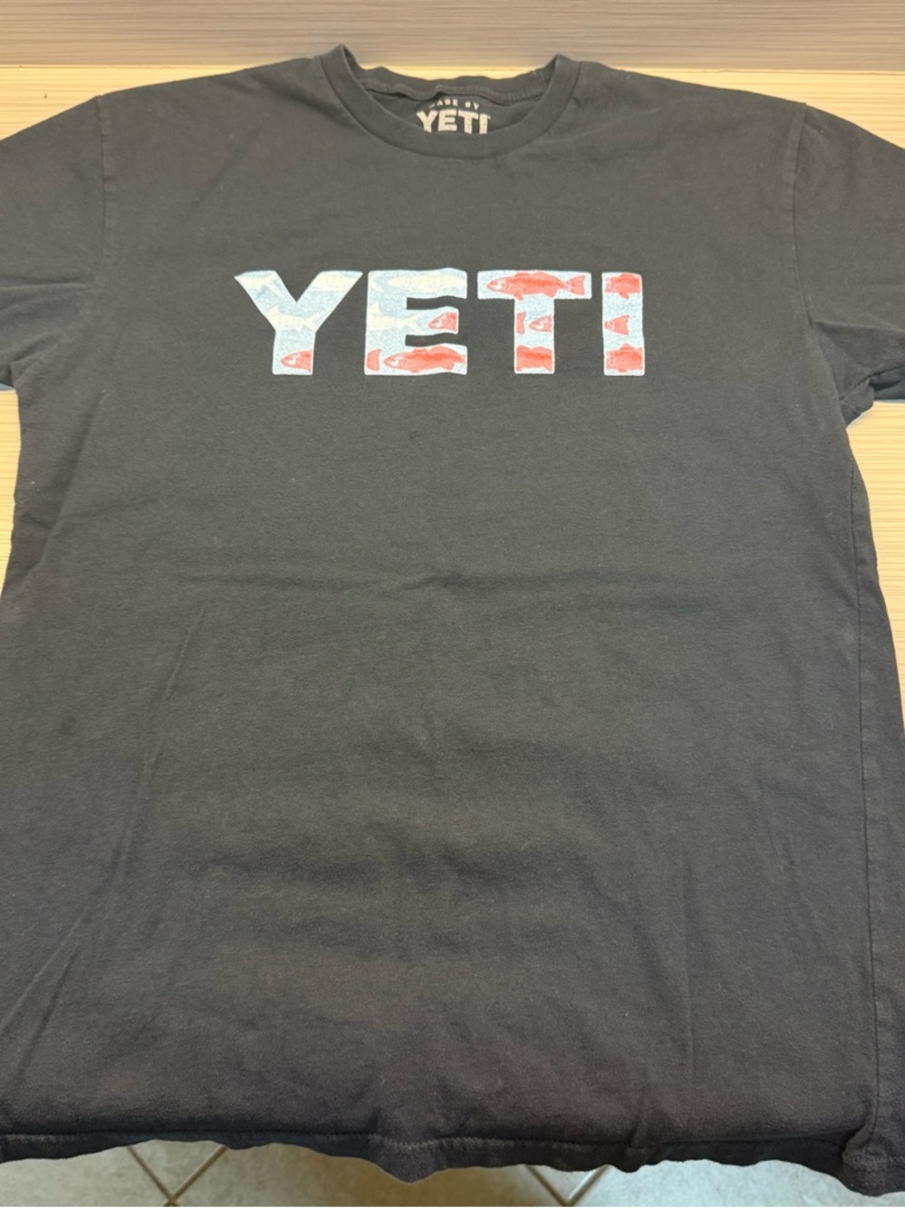 YETI Men's Navy Blue Logo Tee with Red & Light Blue Pattern